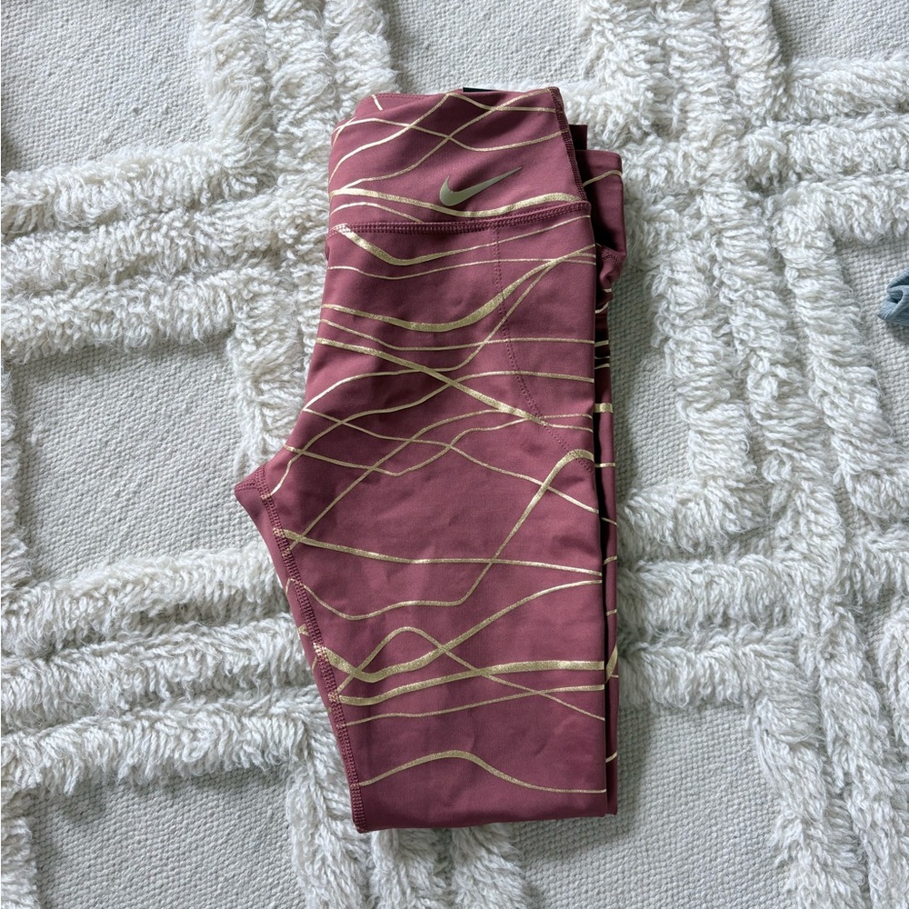 Nike Maroon Leggings with Metallic Gold Wave Accents